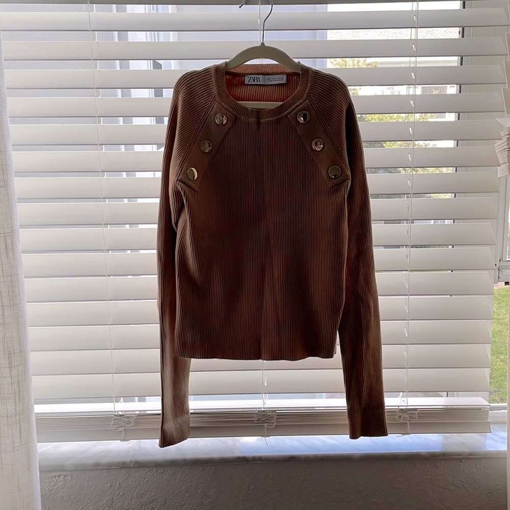 Cream sweater with button details